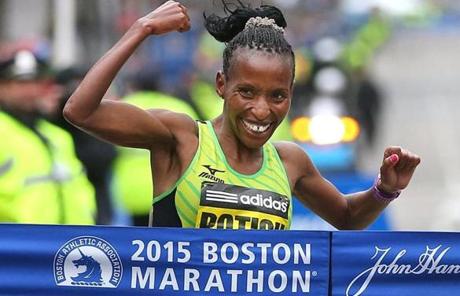 Boston-04/20/15- The Boston Marathon finish line. Womens winner Caroline Rotich. Boston Globe staff photo by John Tlumacki (sports)
